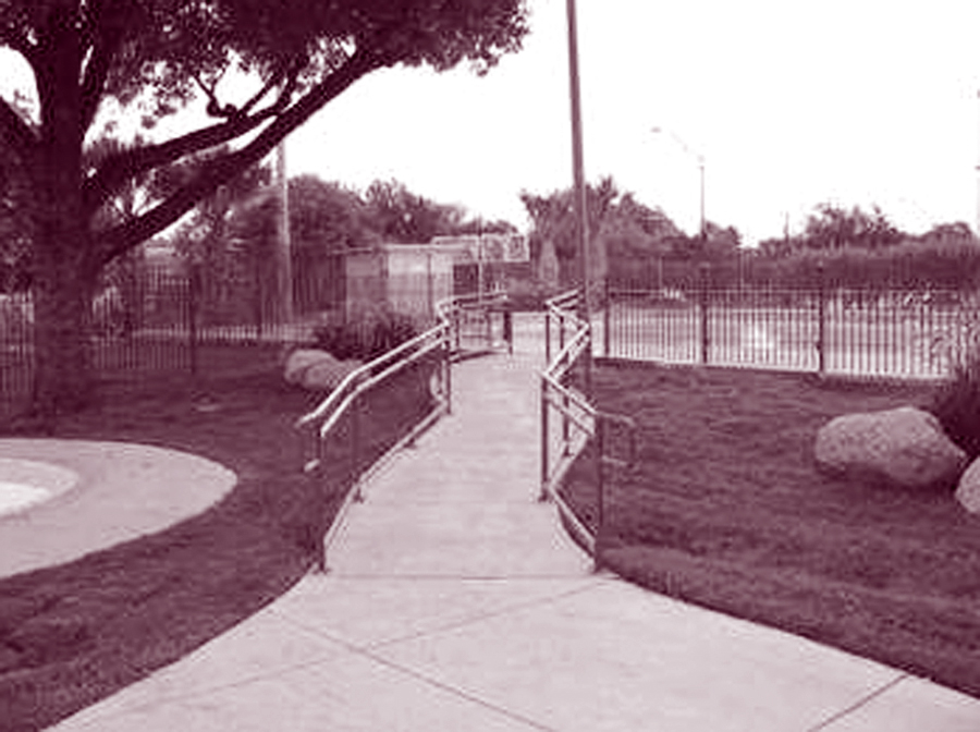 Photo of accessible route to Elmendorf Park swimming pool, San Antonio, Texas