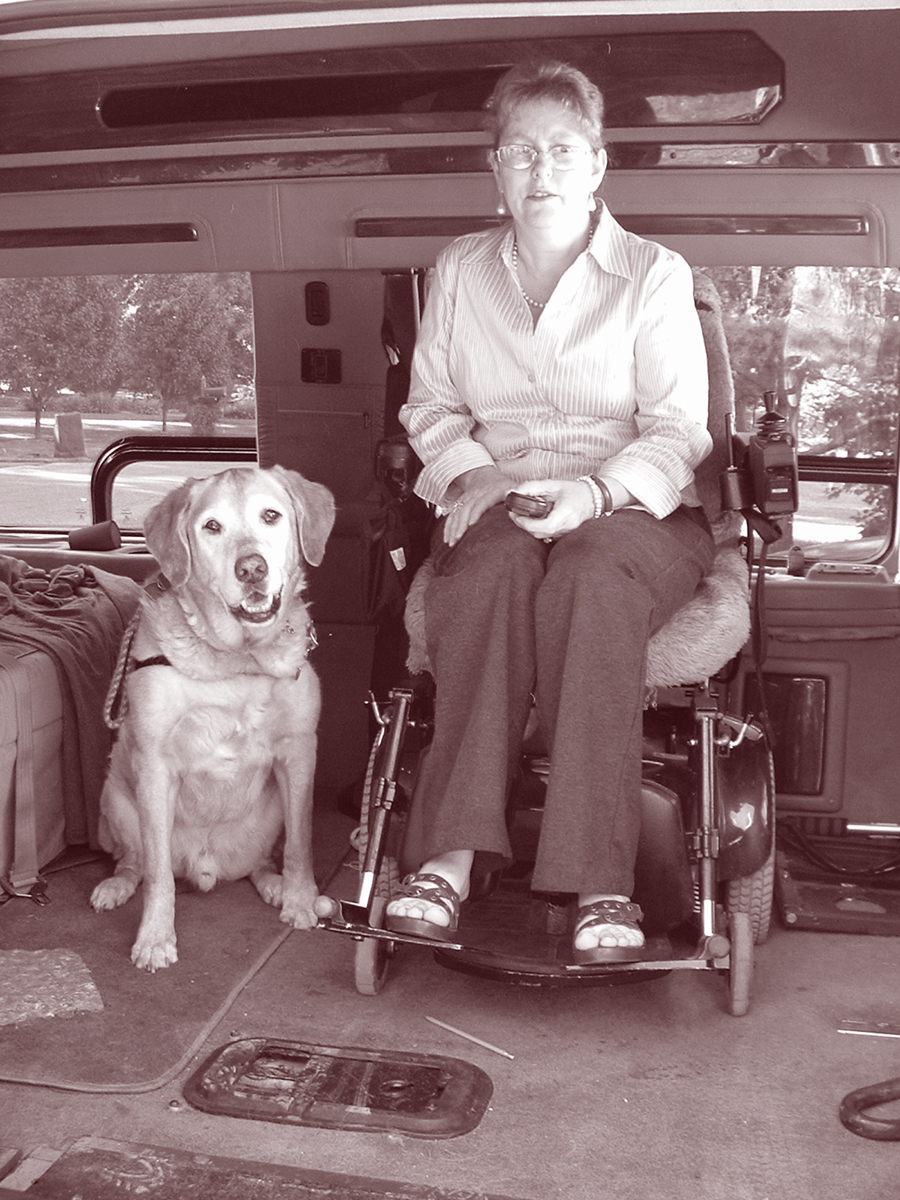 Photo of Betty Barnett pictured with Kirk, her service animal