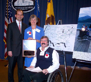 Assistant Attorney General Acosta with Councilwoman Karen Cooper and Vice Mayor and Councilman Albert White of Flagstaff, Arizona