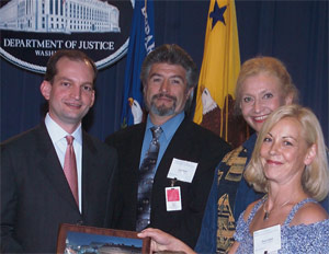 A picture of Mr. Ortiz, next ot AAG Acosta,Mayor Pro-Tem Carol Robertson Lopez, and Raya Soleil of Santa Fe, New Mexico.