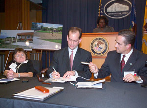 Assistant Attorney General Acosta with Councilwoman Karen Cooper and Vice Mayor and Councilman Albert White of Flagstaff, Arizona