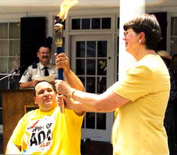 Janet Reno receives Spirit of ADA Torch
