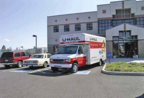 Accessible parking space blocked by delivery truck