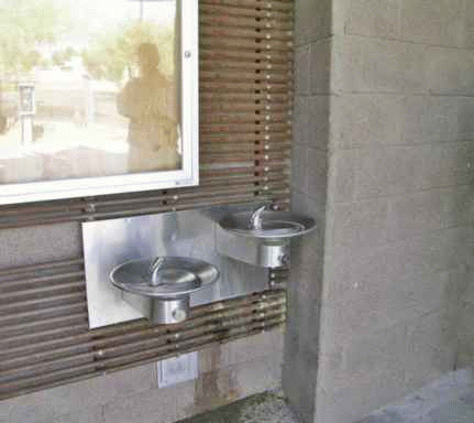 Accessible water fountains which do not protrude into path of travel