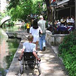 photo of River Walk, pedestrians and restaurant