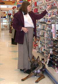 woman with service animal in store