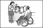 A staff person is filling a cup of soup from a self-serve soup bar for a man using a wheelchair.
