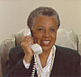 a woman is talking on a phone