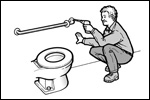 A workman is installing a grab bar beside a toilet.